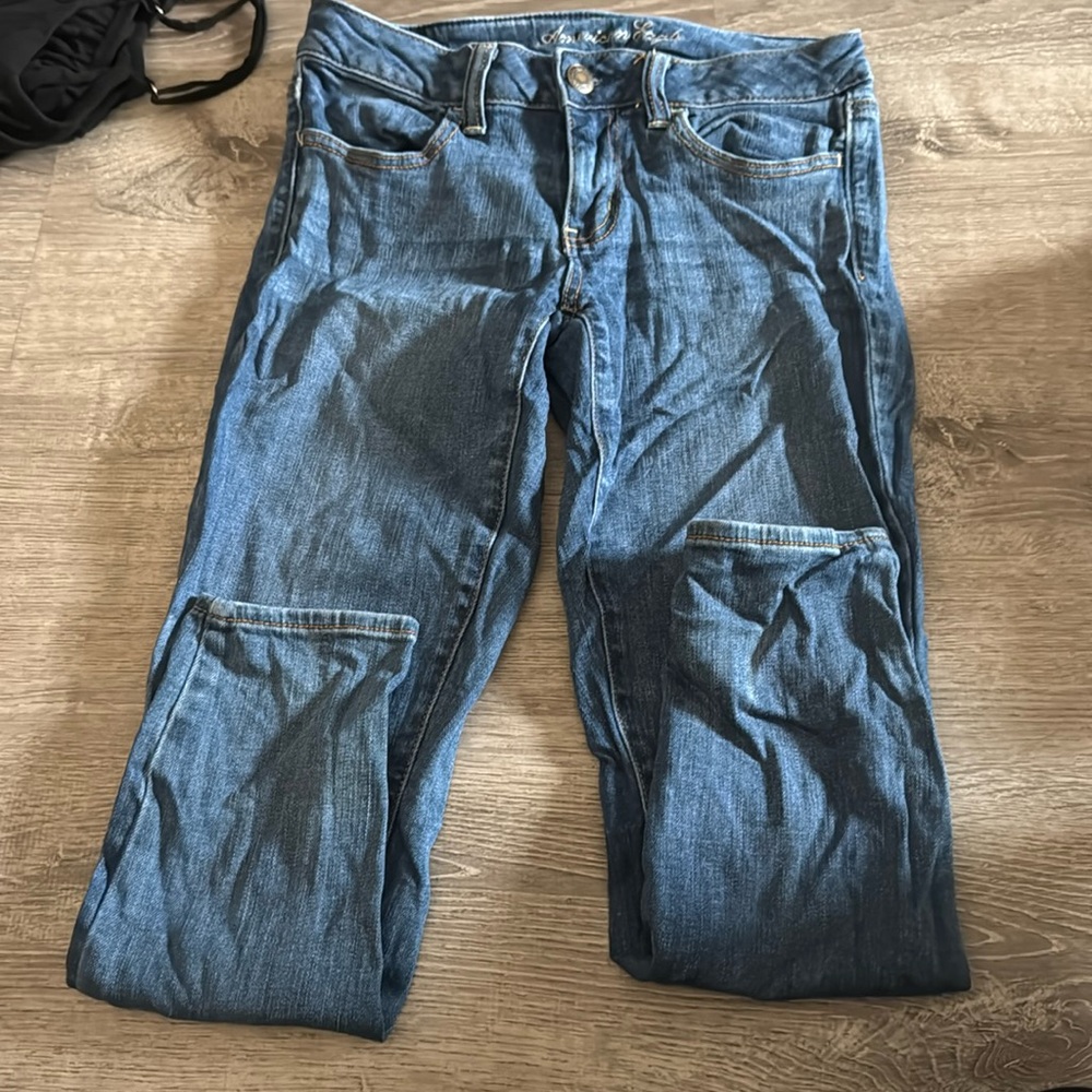 American Eagle blue jeans.